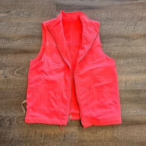 Free People Movement Hit the Hills Reversible Vest in neon coral pink
